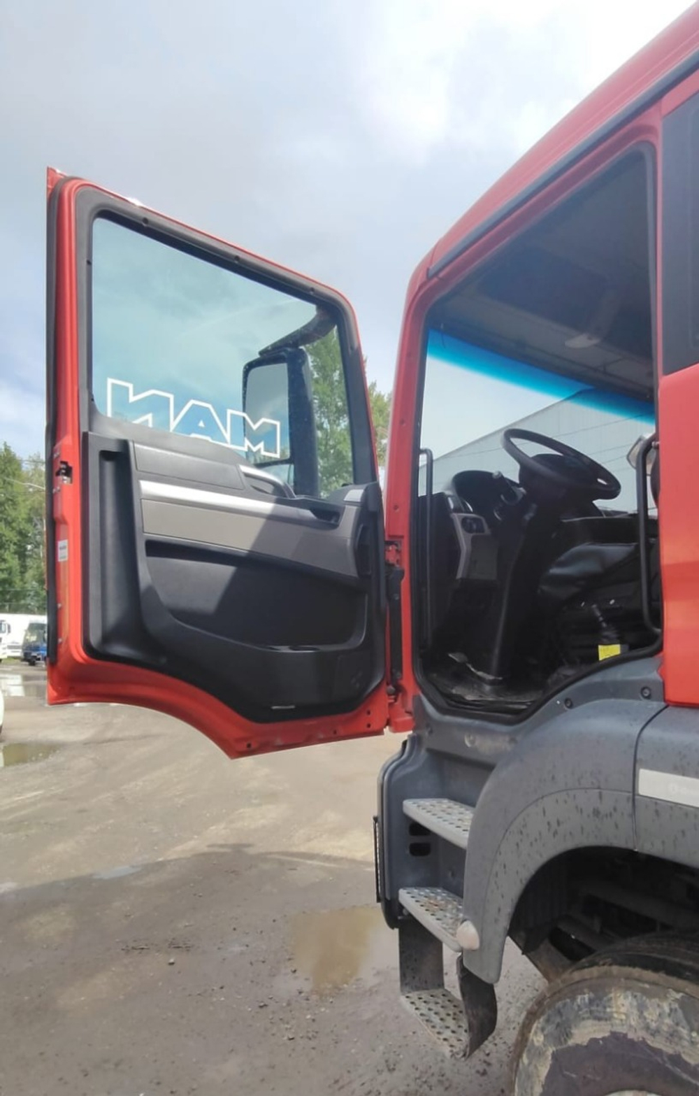 Grunwald 6582* на шасси MAN TGS 8x4 Самосвал 6582-0000010-50 (Дизельный, 10,5 л, 400 л.с., МТ)