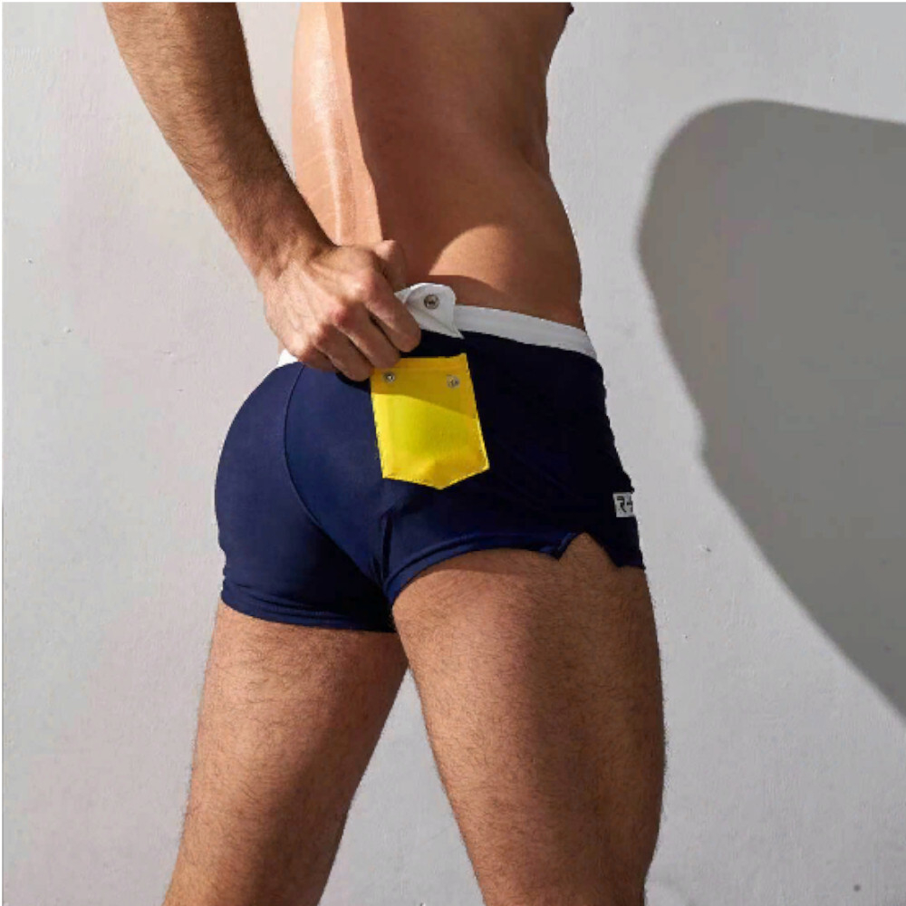 Мужские плавки темно-синие с белой резинкой с желтым карманом сзади Aqux 35253