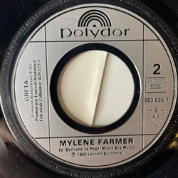 Винтажная виниловая пластинка 7 дюймов (маленькая пластинка) Mylene Farmer Libertine (Франция 1986)