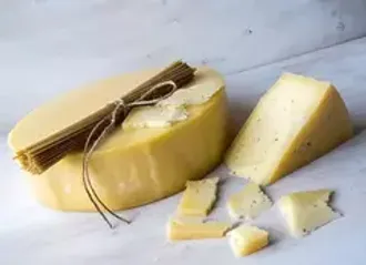 Сыр твердый «Монтазио» целая головка / 5 кг