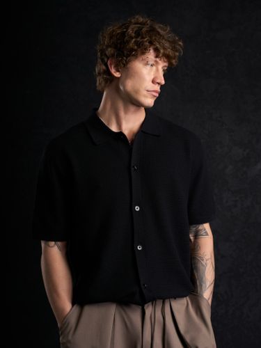 Черная трикотажная рубашка Laine с коротким рукавом