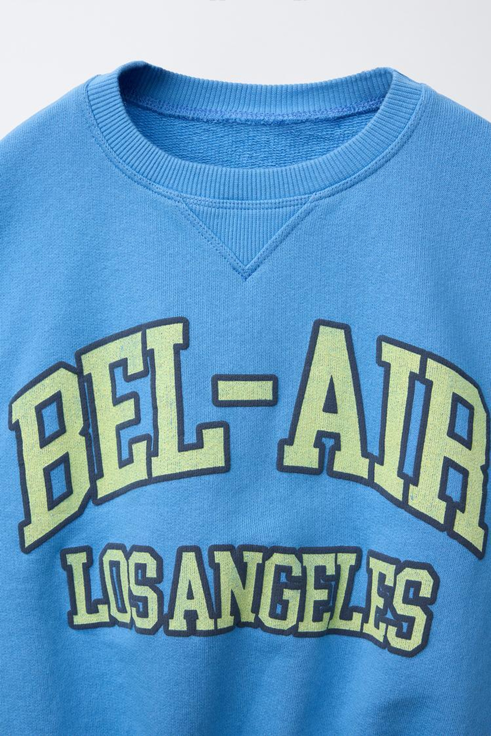 ZARA ТОЛСТОВКА С РЕЛЬЕФНОЙ НАДПИСЬЮ, ЛИНЯЛЫЙ СИНИЙ