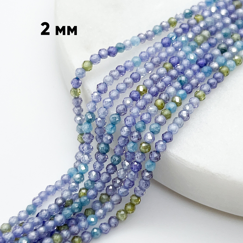 Фианит (кубический цирконий), цвет сине-сиреневый, размер 2 мм, цена за нить около 195 шт (38 см)