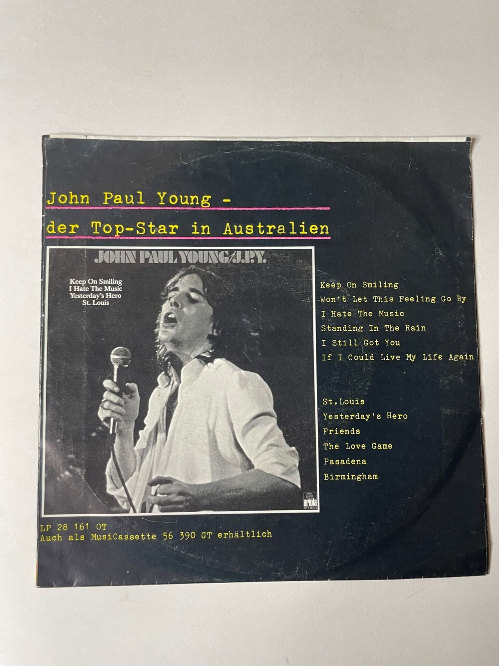 Винтажная виниловая пластинка LP John Paul Young Standing In The Rain / Keep On Smiling (Germany 1977) 7 дюймов