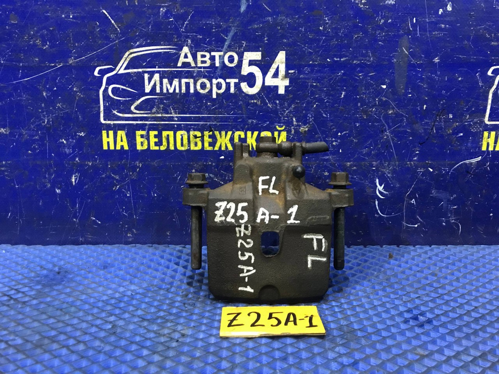 Суппорт тормозной передний левый MITSUBISHI COLT 2003