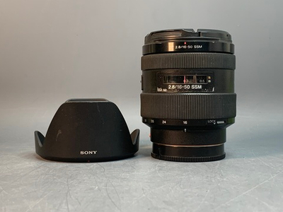 Sony F2.8 16-50 SSM, внутри линзы точки, похоже на налет