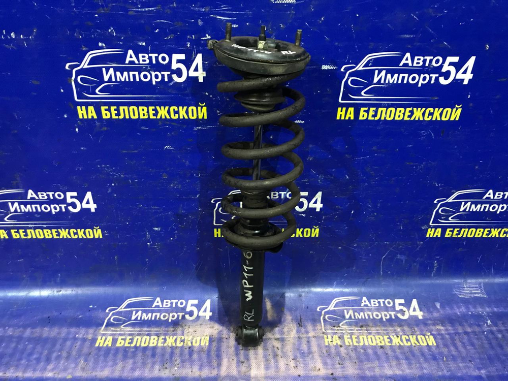 Стойка задняя левая NISSAN PRIMERA 1997