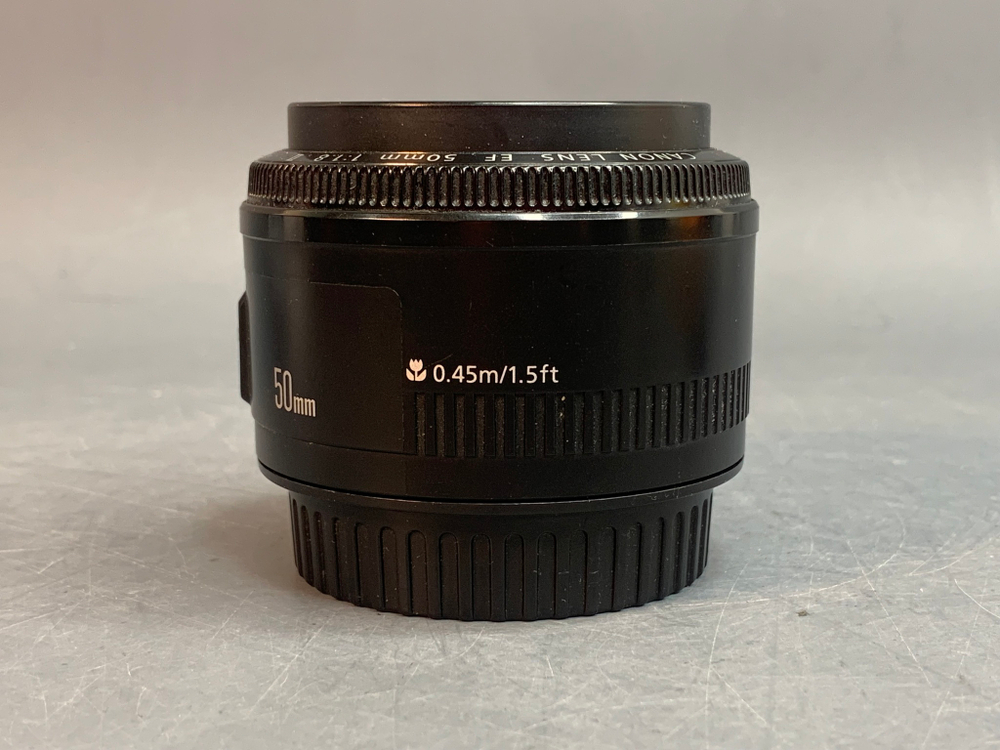 Canon 50mm 1.8 II внутри пылинки