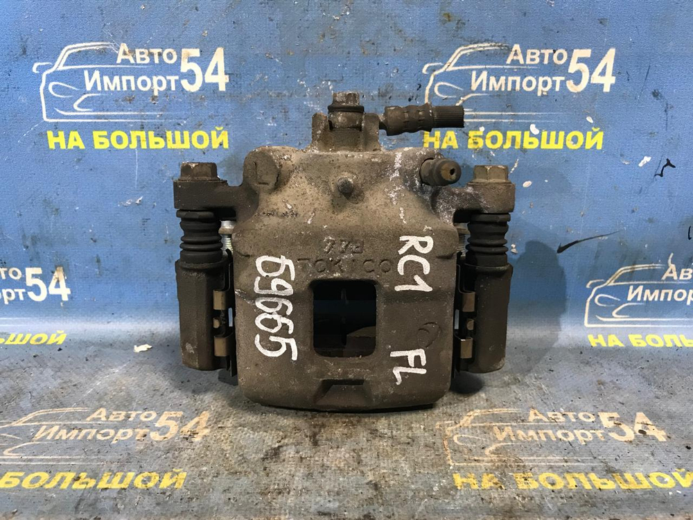 Суппорт тормозной передний левый SUBARU R2 2003-2010