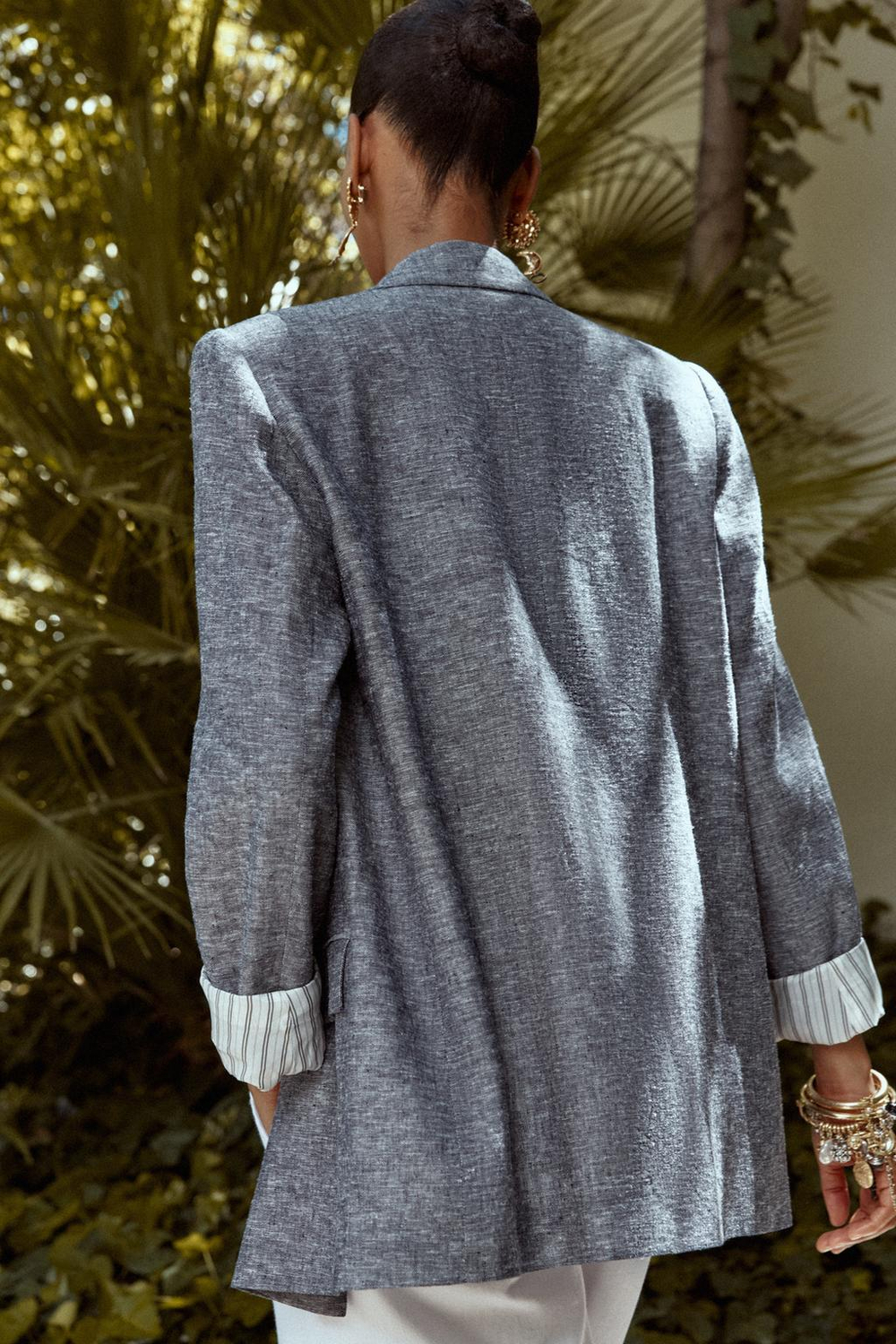 Linen blazer with rolled-up sleeves