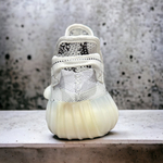 Adidas Ozelia • White