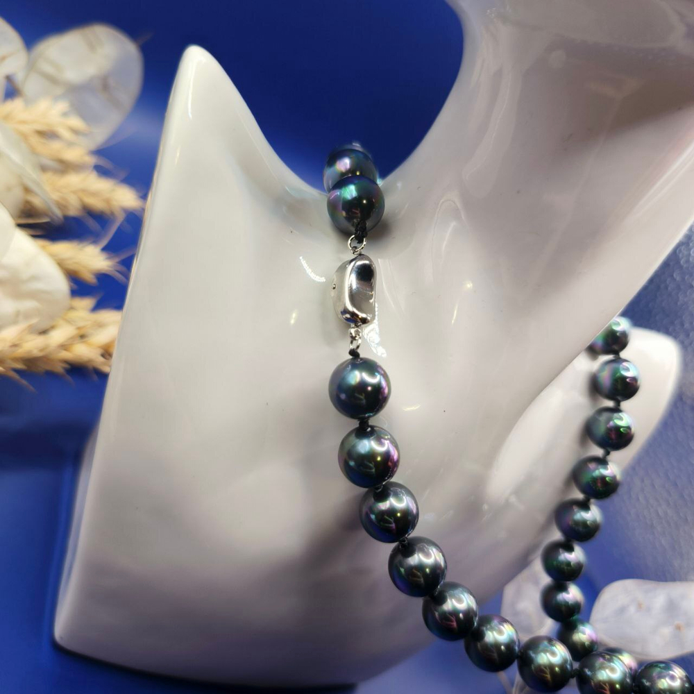 Ювелирное ожерелье из ракушек 10мм.