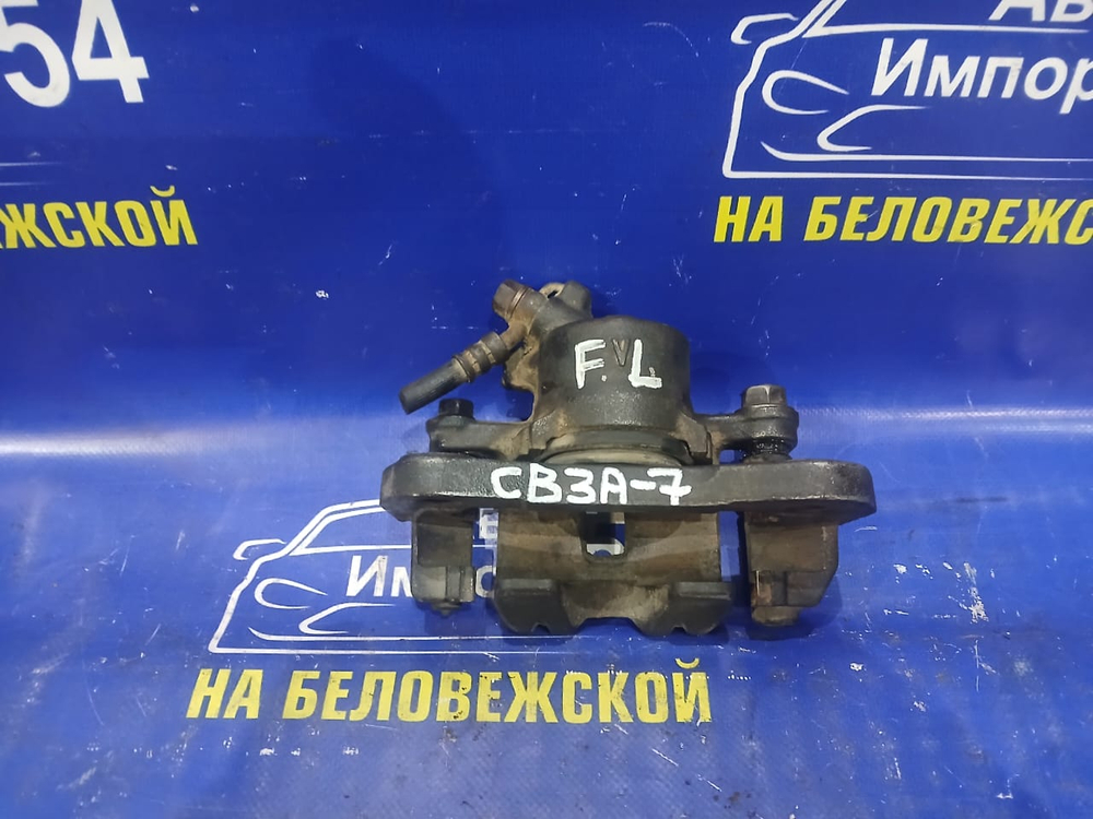 Суппорт тормозной передний левый MITSUBISHI MIRAGE 1992