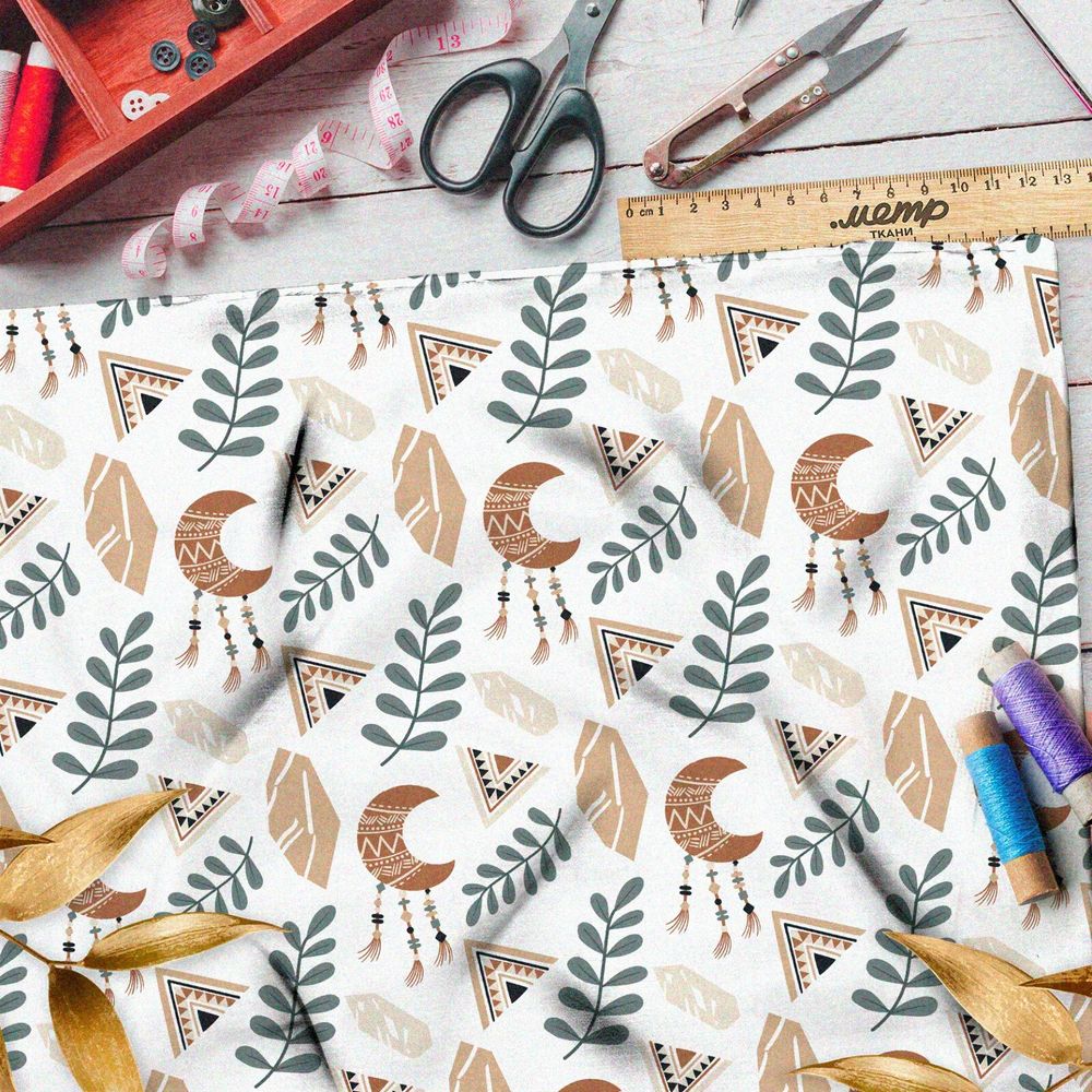 Ткань штапель племенные символы и листья на бежевом фоне