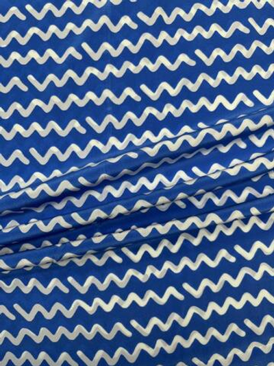 Шелк голубой с белыми узорами