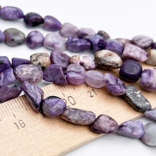 Чароит бусины, галтовка, размер около 6-9 мм, цена за нить 38 см