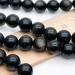 Обсидиан "Золотой" бусины, диаметр 8,2-8,5 мм, цена за 22-23 шт (1/2 нити)