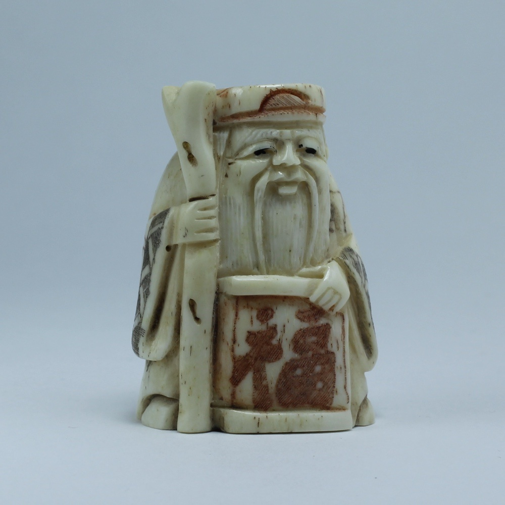 Нэцкэ Дзюродзин с посохом и иероглифом счастье