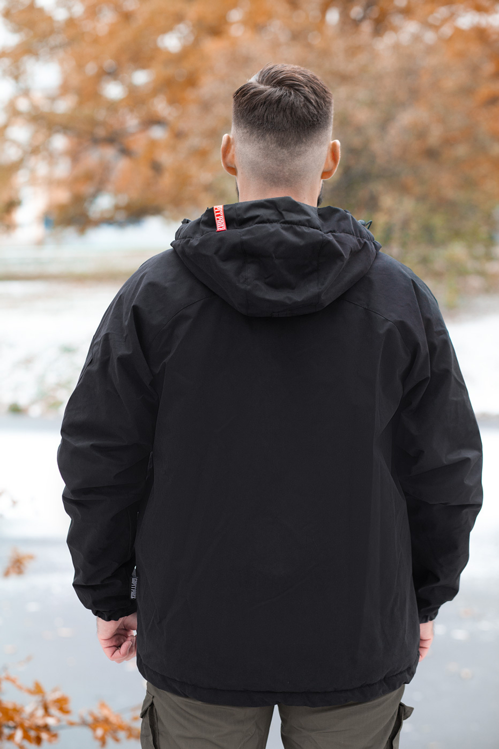 Black windbreaker