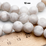 Агат "белый" бусины, диаметр около 10,4-10,6 мм, цена за 18-19 шт (1/2 нити)
