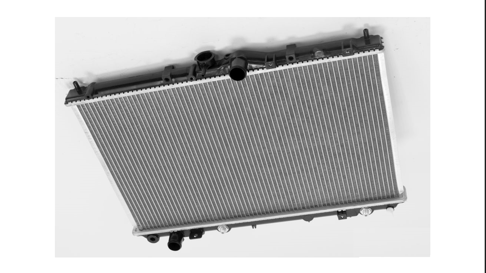 Радиатор охлаждения Mitsubishi Carisma