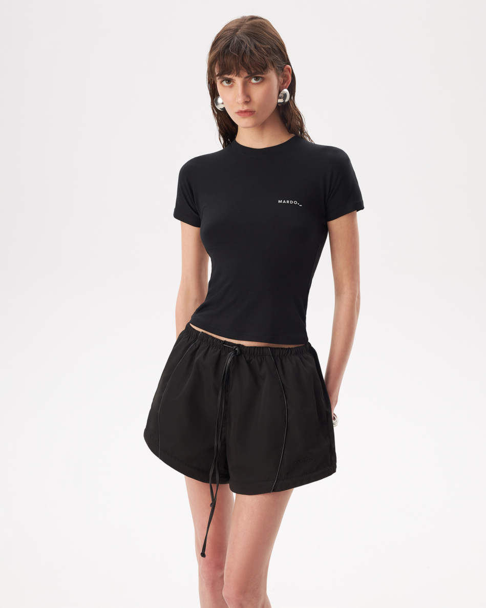 BLACK TRANSFORMING TRACKPANTS