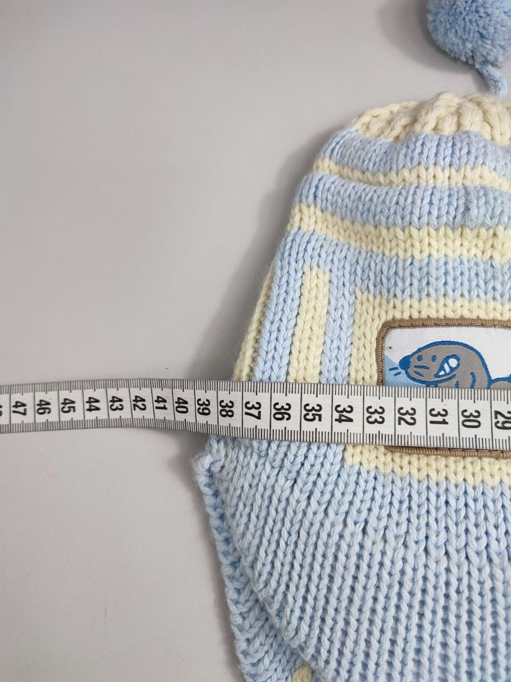 Шапка  Kotik практичная