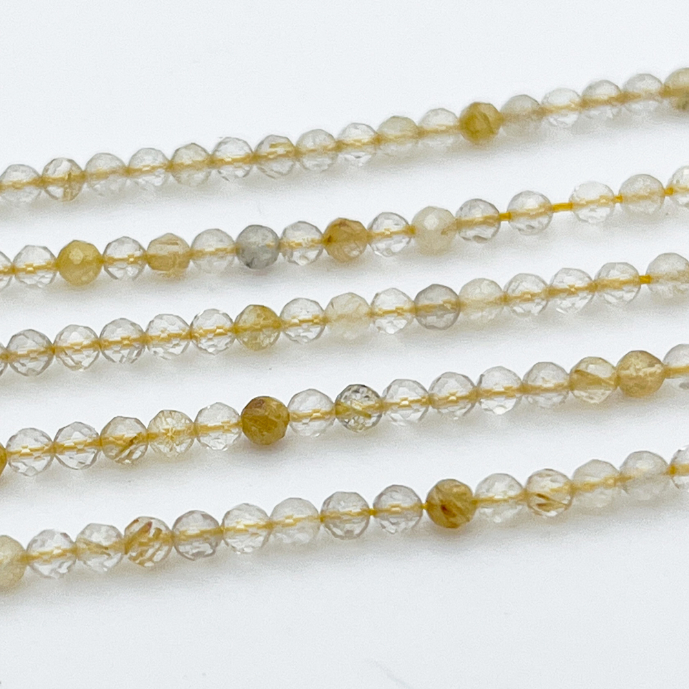 Кварц рутиловый граненый, размер около 2,6 мм, цена за 71-72 шт (1/2 нити)