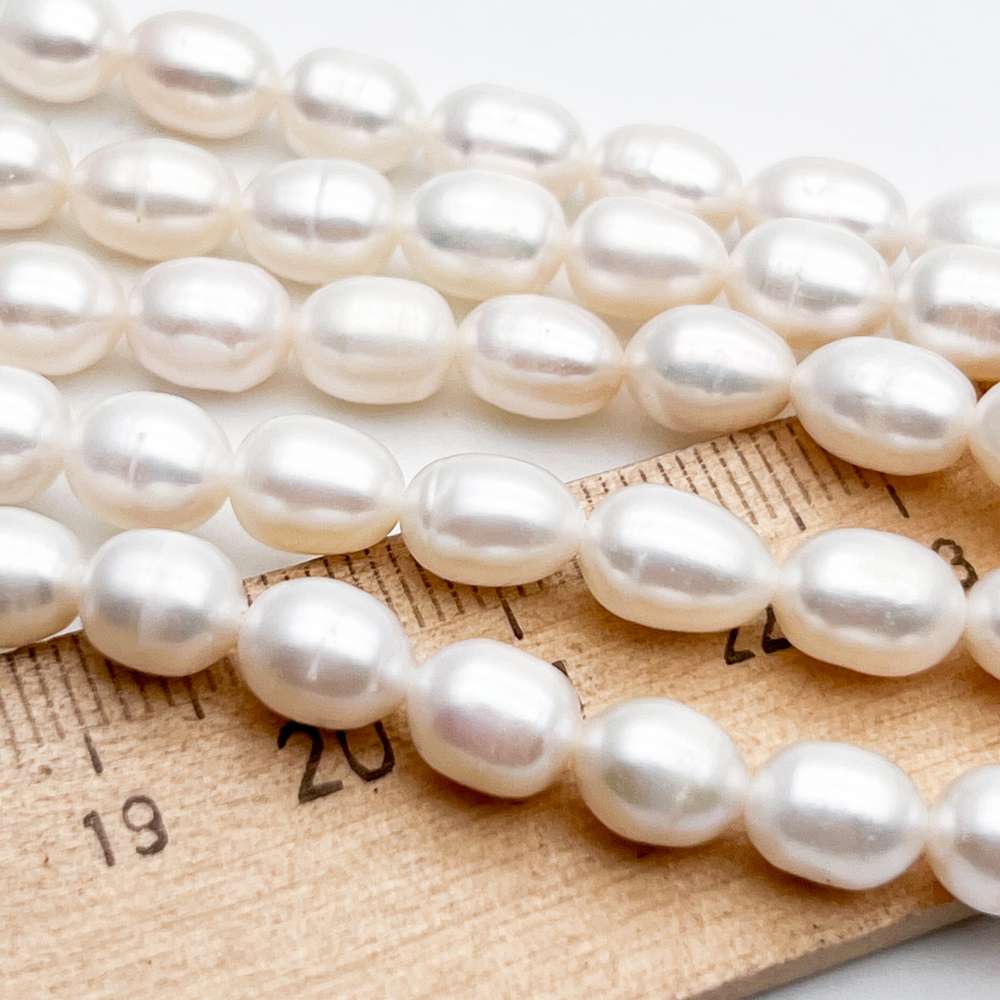 Жемчуг Рис, размер около 7-8,5 мм, цена за отрезок 17 см (1/2 нити)