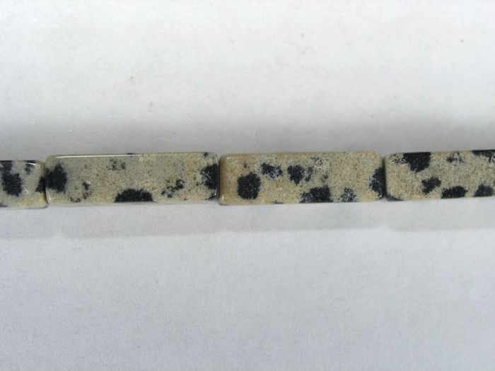 Бусина из яшмы далматинец, фигурная, 4x13 мм (цилиндр, граненая)