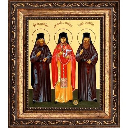 Икона Оптинских Новомучеников на холсте с мощевиком.