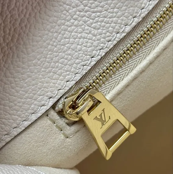 Сумка Louis Vuitton Onthego кремовый