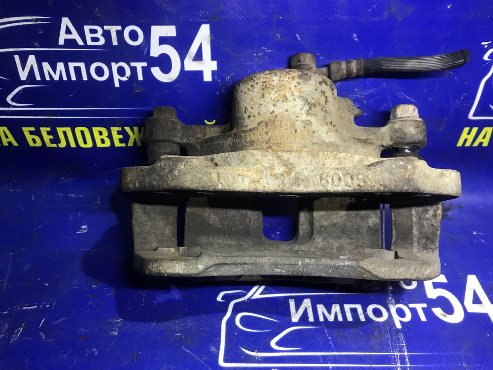 Суппорт тормозной передний левый ISUZU RODEO 1994