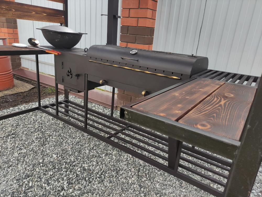 Мангальная зона Многофункционал Макс 5 мм с крышей: шашлык + казан + коптильня (Казань) Если вы хотите мангальную зону купить в Казани и нужна мангальная зона с крышей, обратите внимание на мангальную зону Многофункционал Макс 5 мм: это мангальный комплекс 5 мм, зона барбекю, уличная кухня для дачи и дома, мангал с крышкой барбекю, мангал с термометром, мангал с термодатчиком, мангал с шиберами, регулировка тяги, мангал коптильня, коптильня горячего копчения, коптить рыбу, коптить мясо, коптить курицу, мангал 90x40x15, мангал на 11 шампуров, жаровня 5 мм, мангал с зольниками, колосник, поддув, печь под казан 5 мм, печь под казан 40x40x30, печь под казан с трубой, труба 80x80, заслонка на трубе, казан 3 л, казан 4 л, казан 6 л, казан 8 л, казан 10 л, казан 12 л, кольца под казан, мангальная зона со столиками, столик для нарезки, боковые столы металл дерево, дровница большая, тубус для шампуров, разборная мангальная зона, мангальная зона в наличии Казань, доставка мангальной зоны Казань, установка мангальной зоны