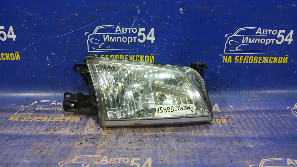 Фара передняя правая MAZDA DEMIO 1999-2002
