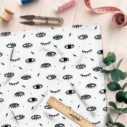 Ткань флис черные глазики