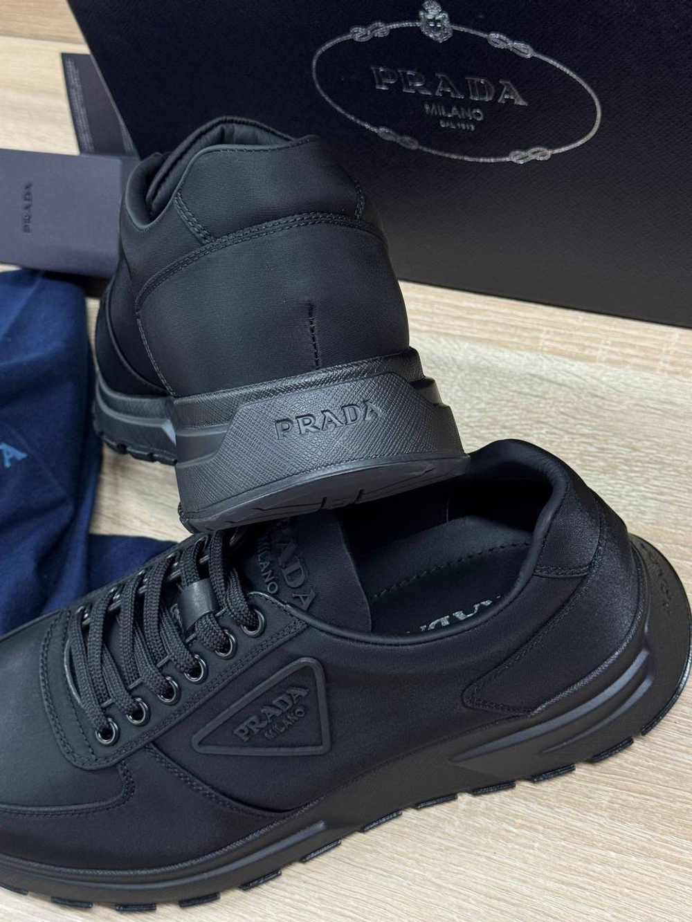 Кроссовки Prada