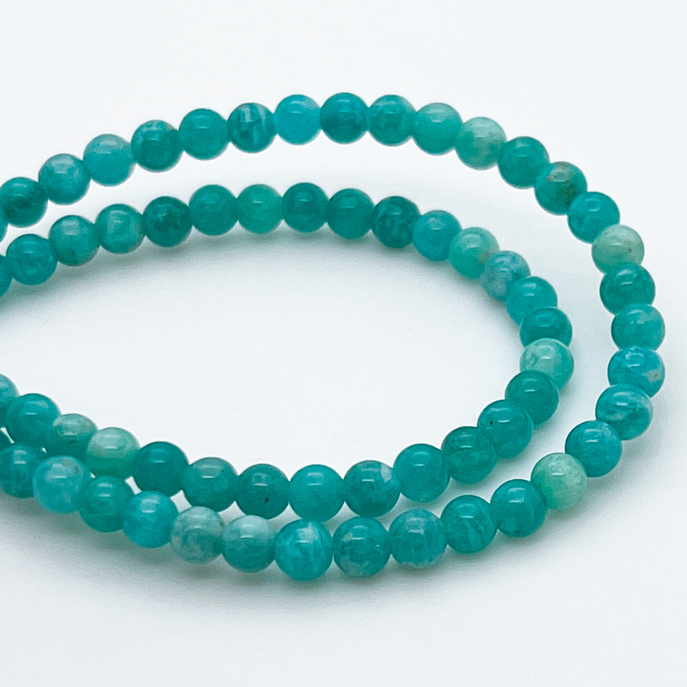 Амазонит, диаметр 4,2 мм, цена за 49-50 шт (1/2 нити)