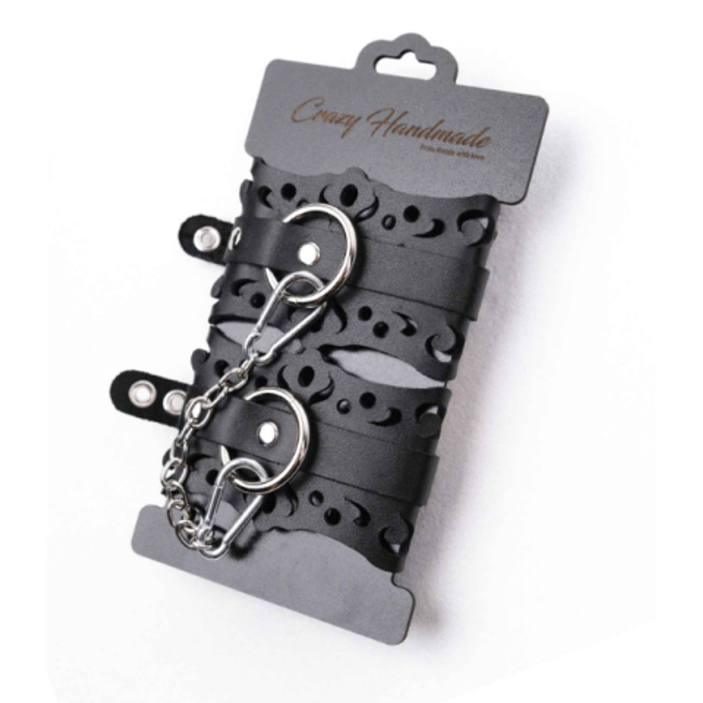 Наручники из черной кожи с узорами