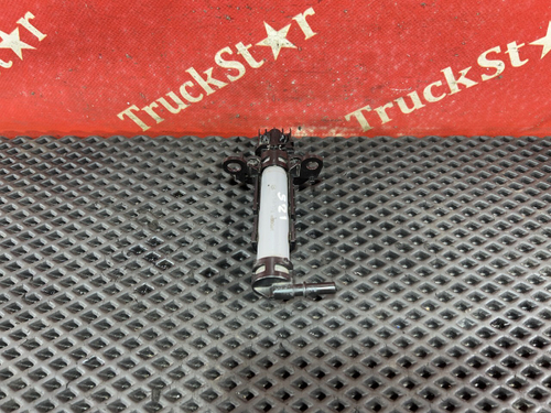 Форсунка омывателя фары левая