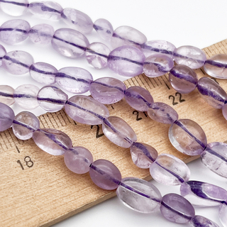 Аметист лавандовый бусины, галтовка, размер около 7-9 мм, цена за отрезок 19 см (1/2 нити)