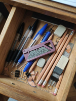 Нож для сменных трапециевидных лезвий.