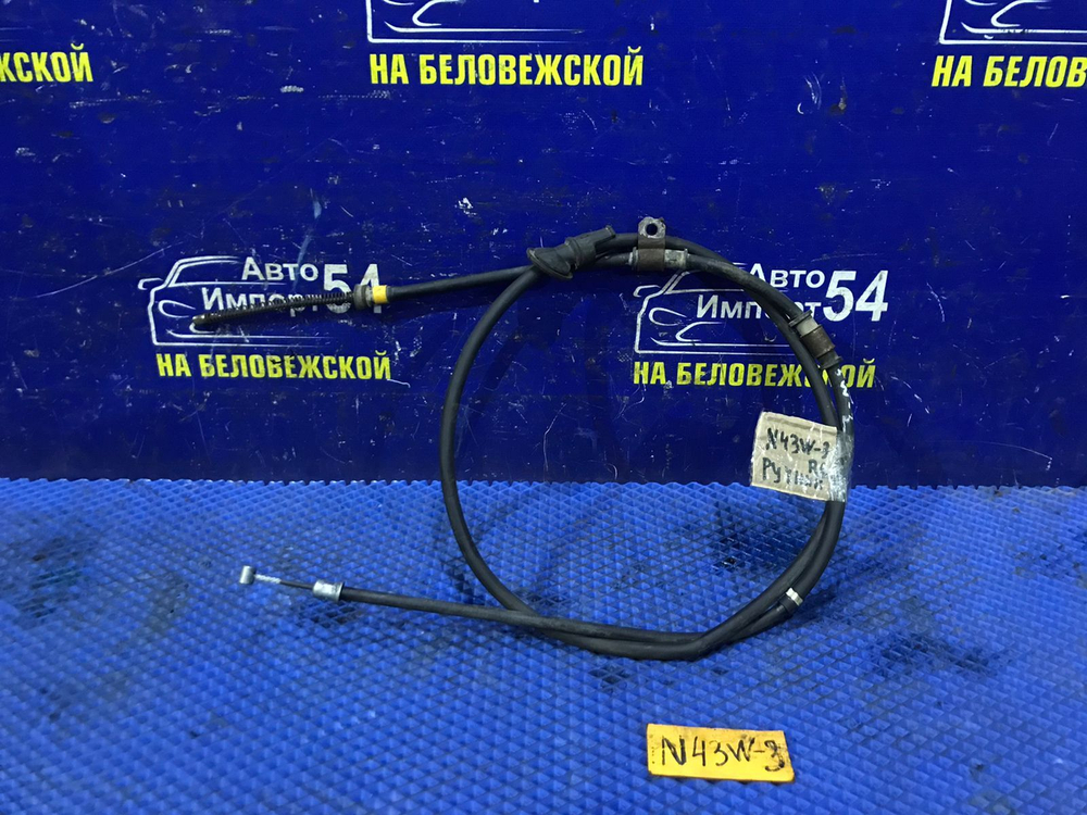 Трос ручника левый MITSUBISHI CHARIOT 1994