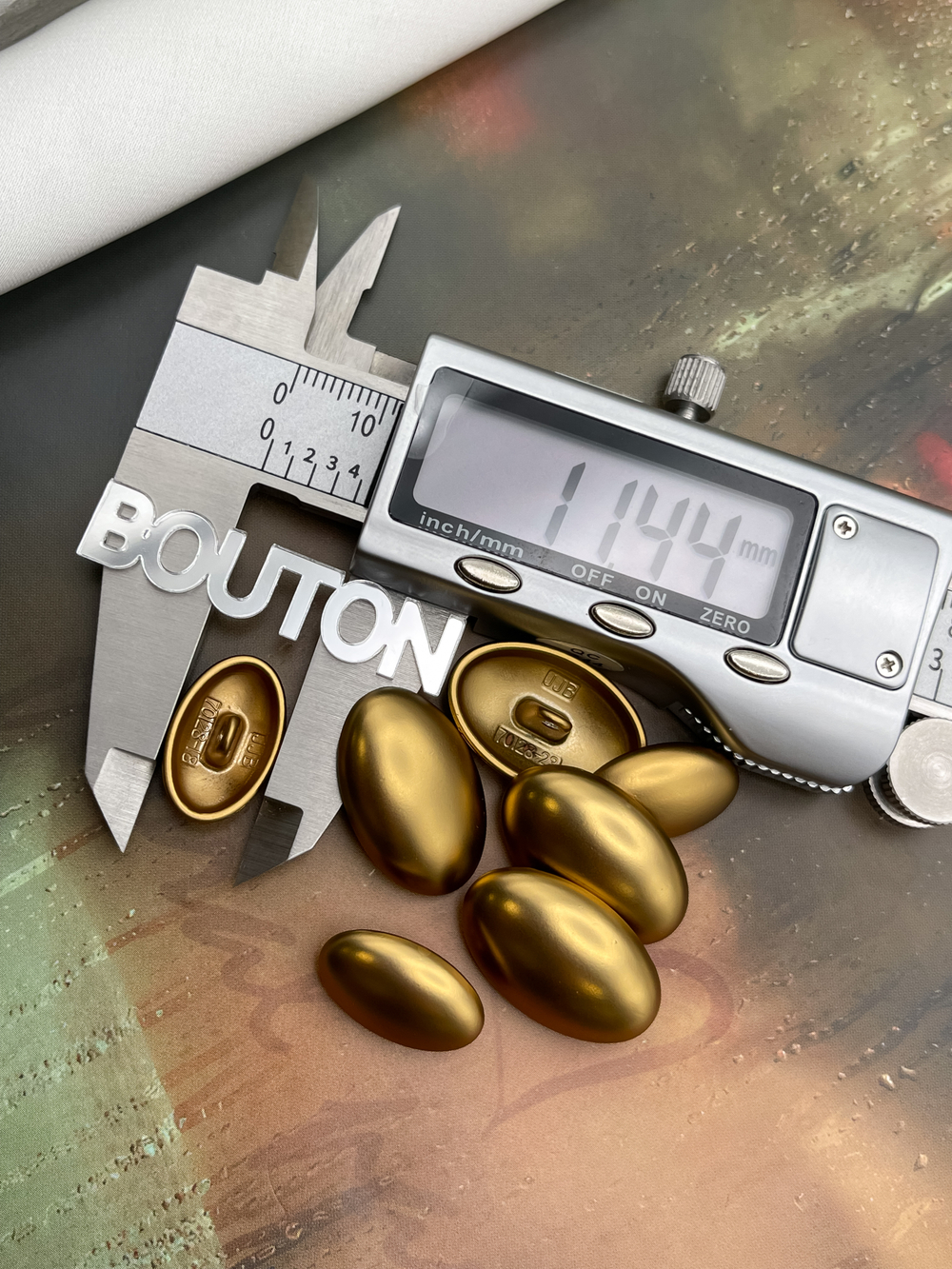 Пуговицы овальные бронзовые