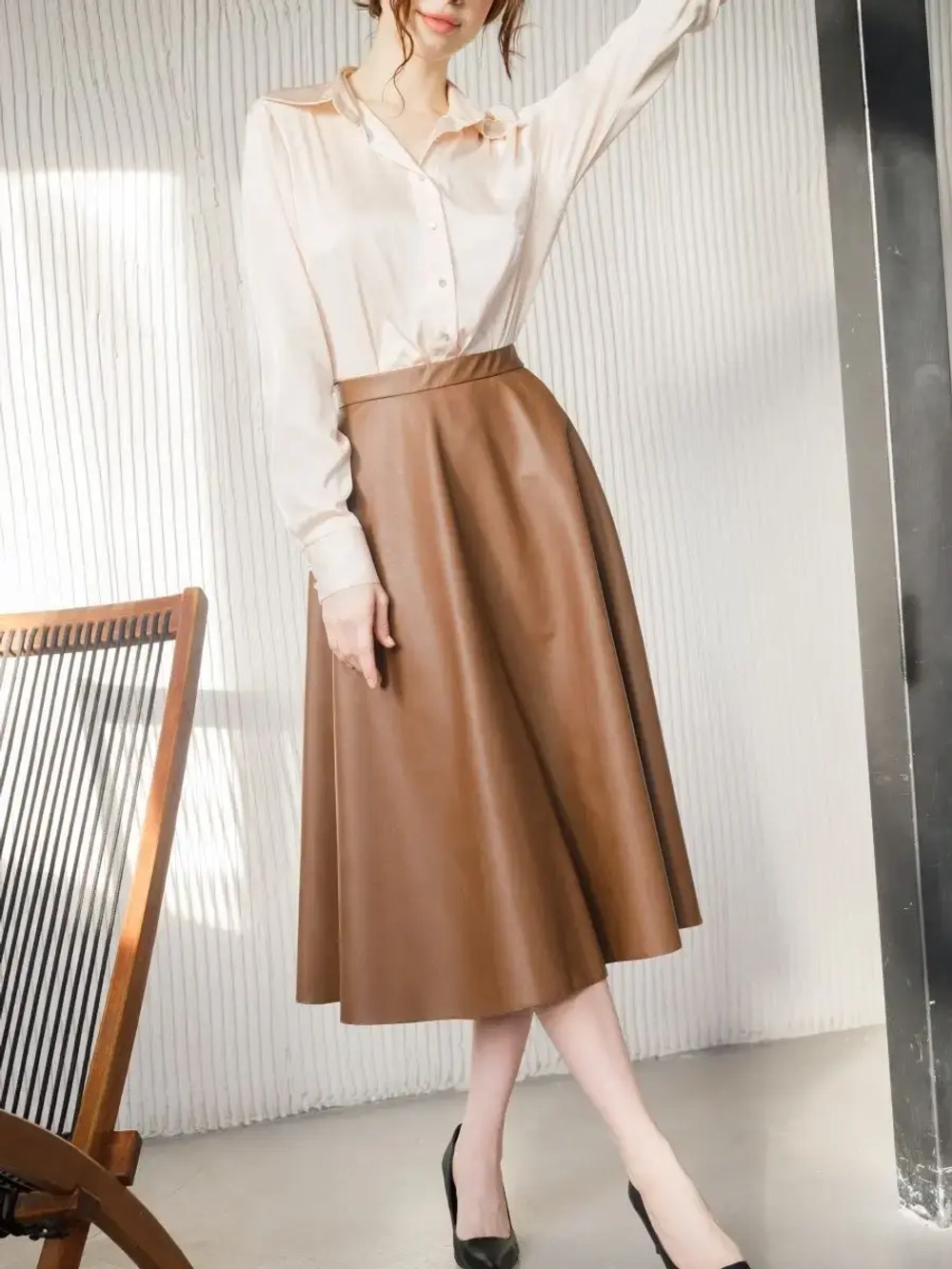 Юбка кожаная миди трапеция