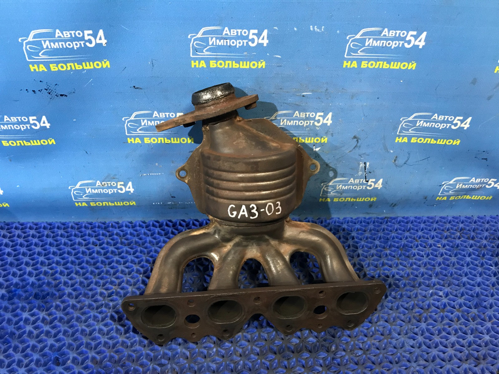 Коллектор выпускной Honda LOGO 2000