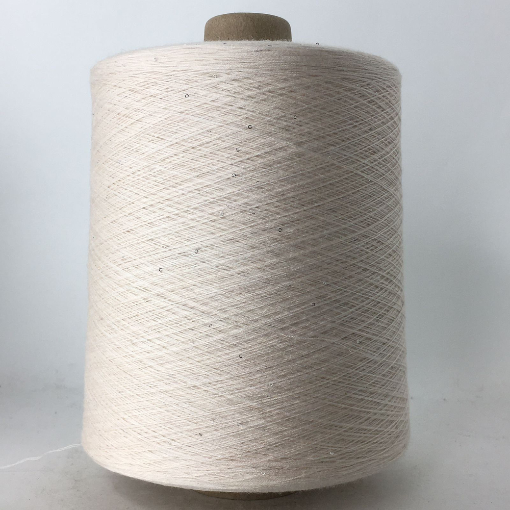 TRANSFORMARE ; 50% кашемир, 50% PVA, пайетки серебро 1мм; 2500м /100гр; цвет: ivory Только мал. бобинки: 127, 90, 37гр.
