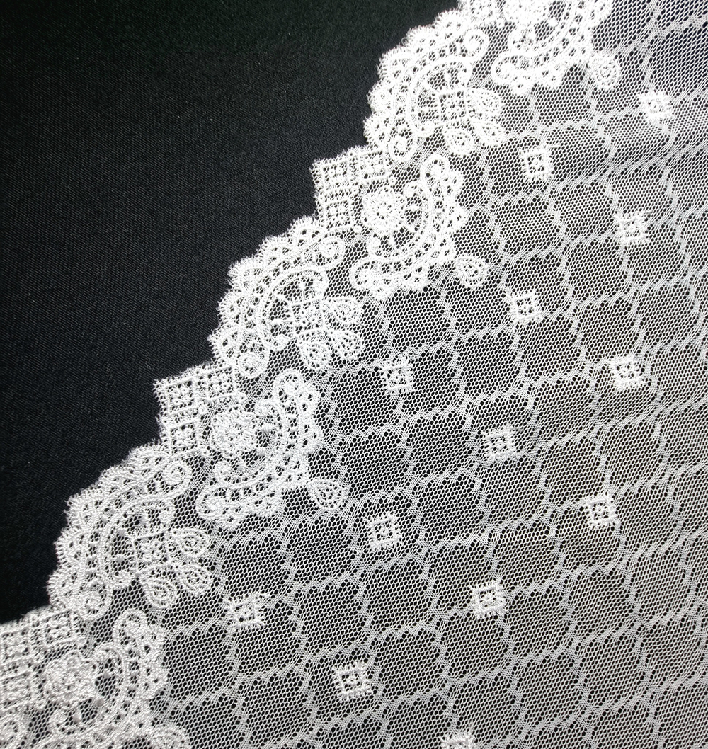 Вышивка на сетке белая К136