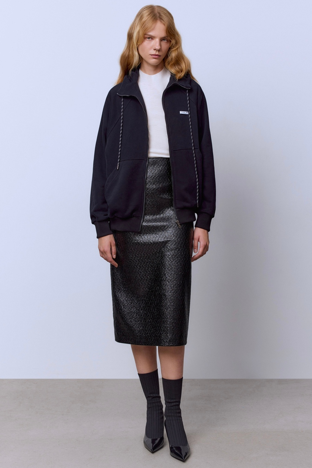 Юбка из лакового твида