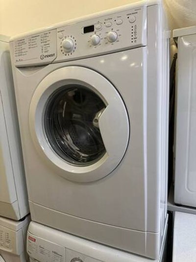 Стиральная машина Indesit IWUD4105 Б/У фронтальная 4 кг до 1000 об/мин